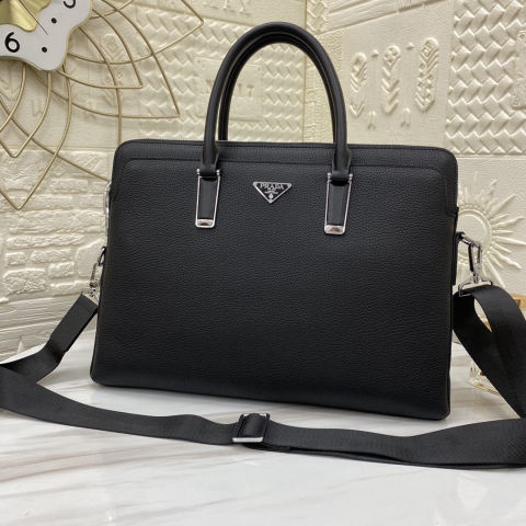 PRADA combination lock briefcase, can be carried by hand or slung across the body.