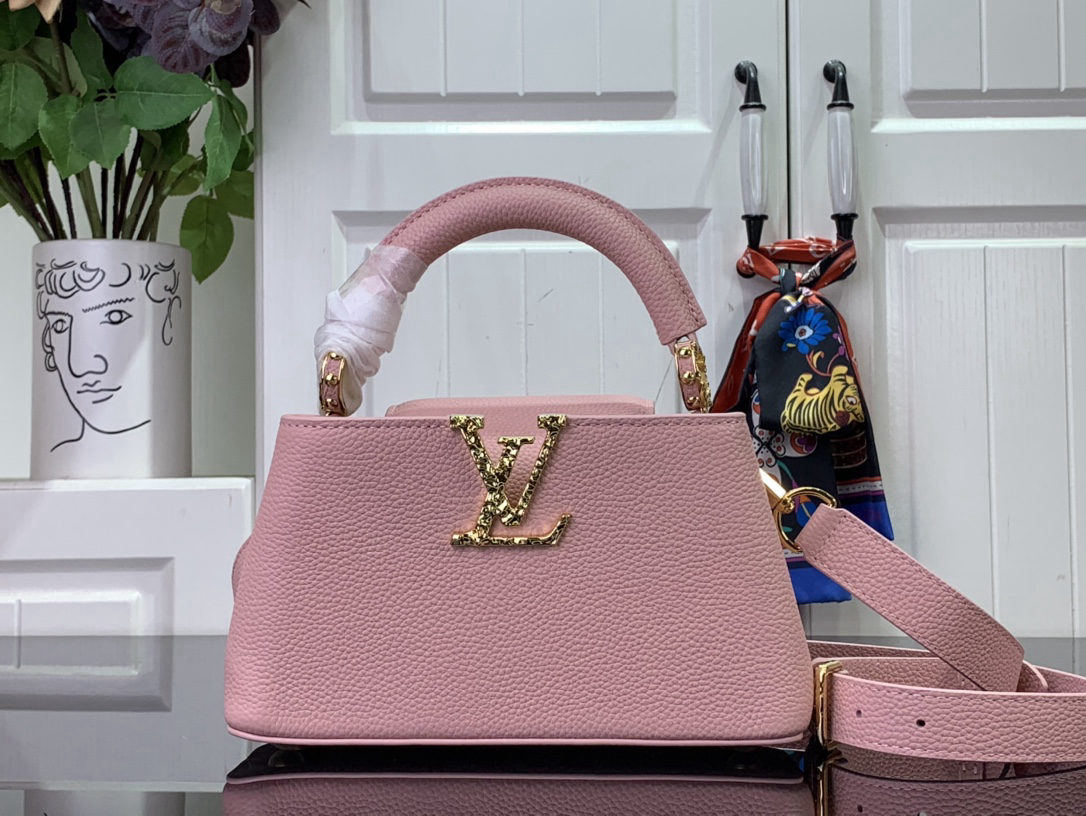 LV Capucines East West