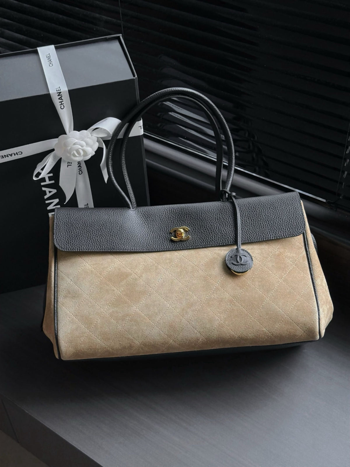 CHANEL suede and leather baguette bag