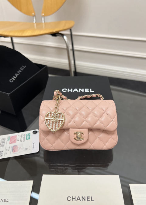 CHANEL small charm bag