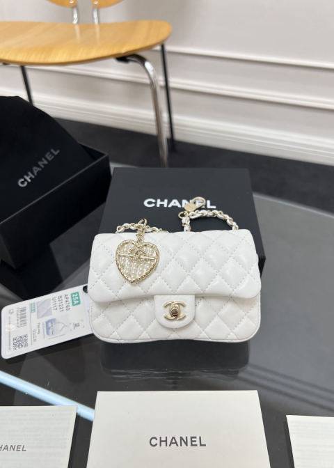 CHANEL small charm bag