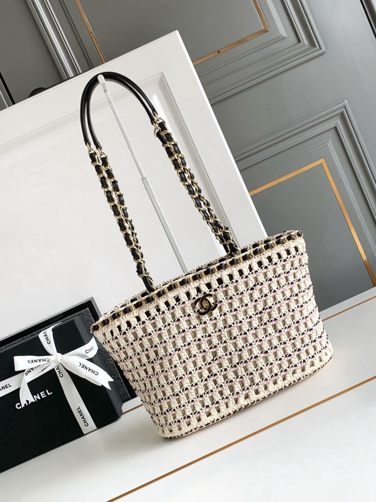 Black and light pink CHANEL early spring collection hand-woven vegetable basket