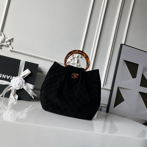 CHANEL suede bucket bag with tortoiseshell handles