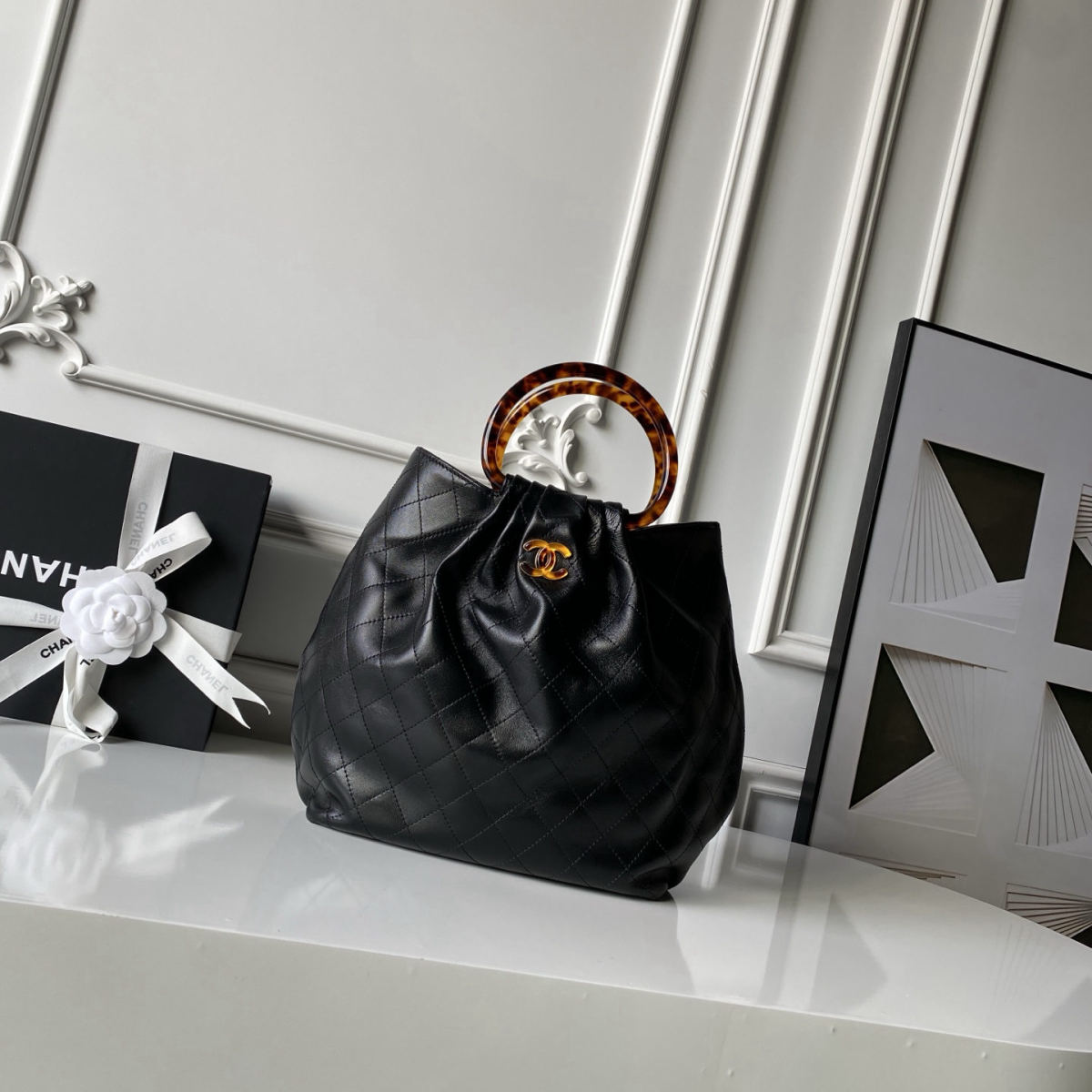 CHANEL bucket bag with tortoiseshell handle