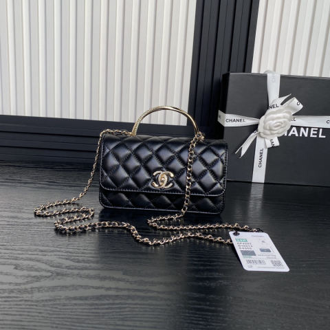 CHANEL accordion bag with rhinestone handle
