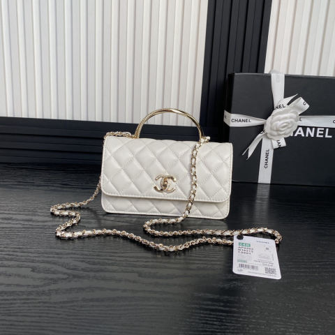CHANEL accordion bag with rhinestone handle