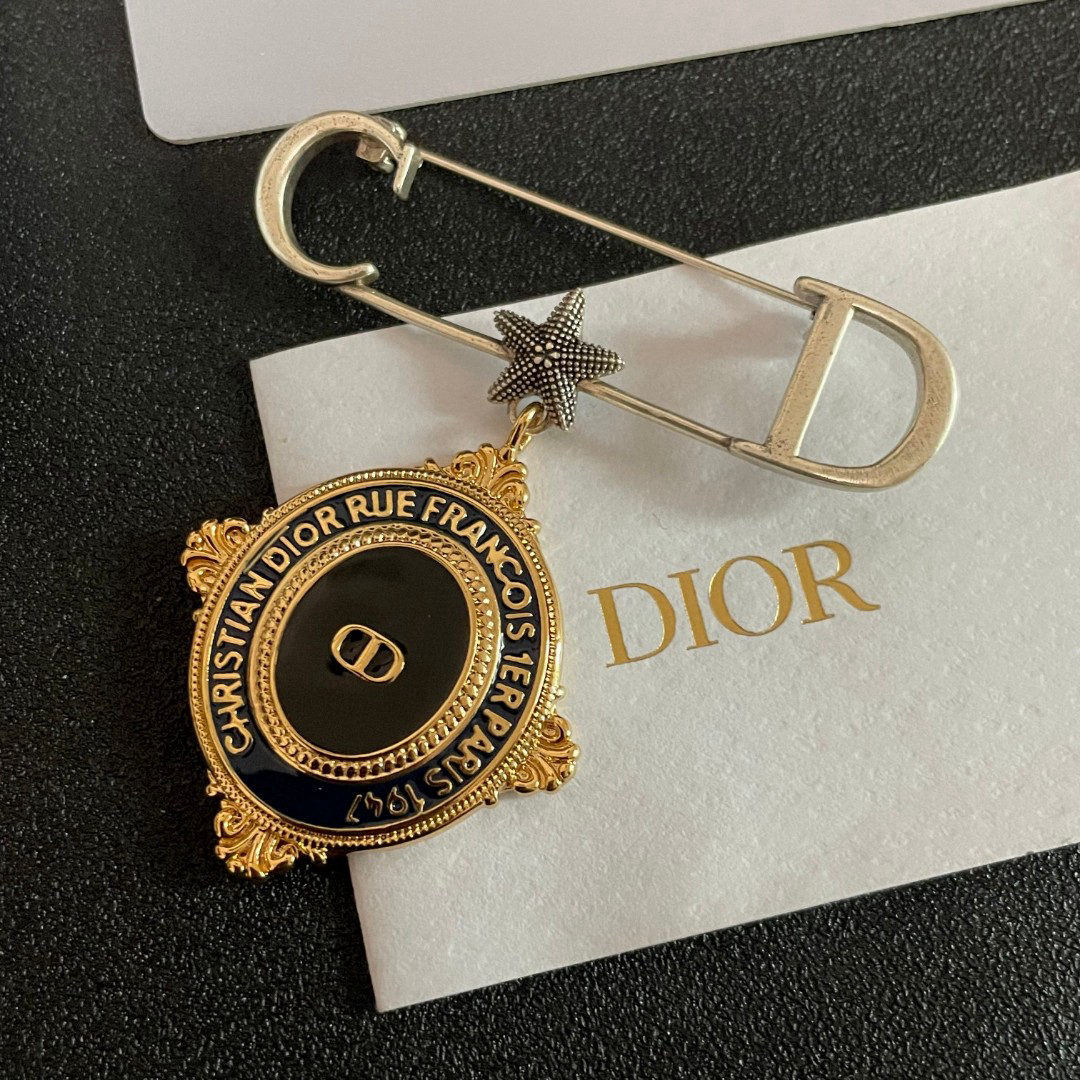 DIOR letter brooch