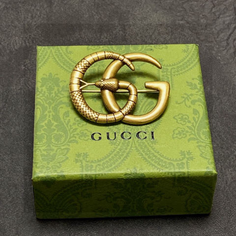 Gucci double G vintage bronze brooch