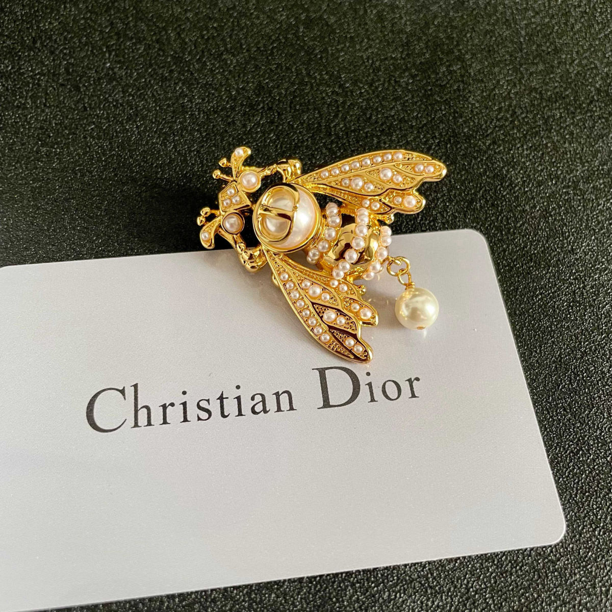 DIOR letter brooch