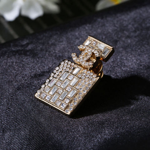 Chanel Fall/Winter collection perfume bottle diamond double C brooch