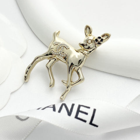 CHANEL Light Gold Reindeer Double C Brooch