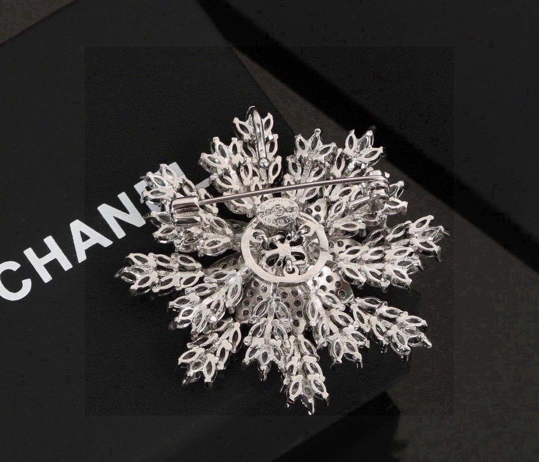 CHANEL Snowflake Brooch