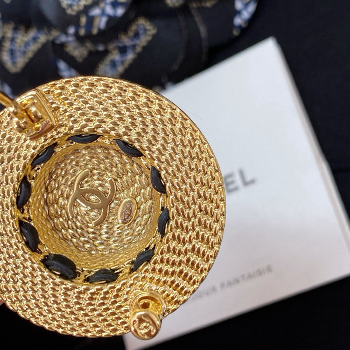 Chanel straw hat brooch