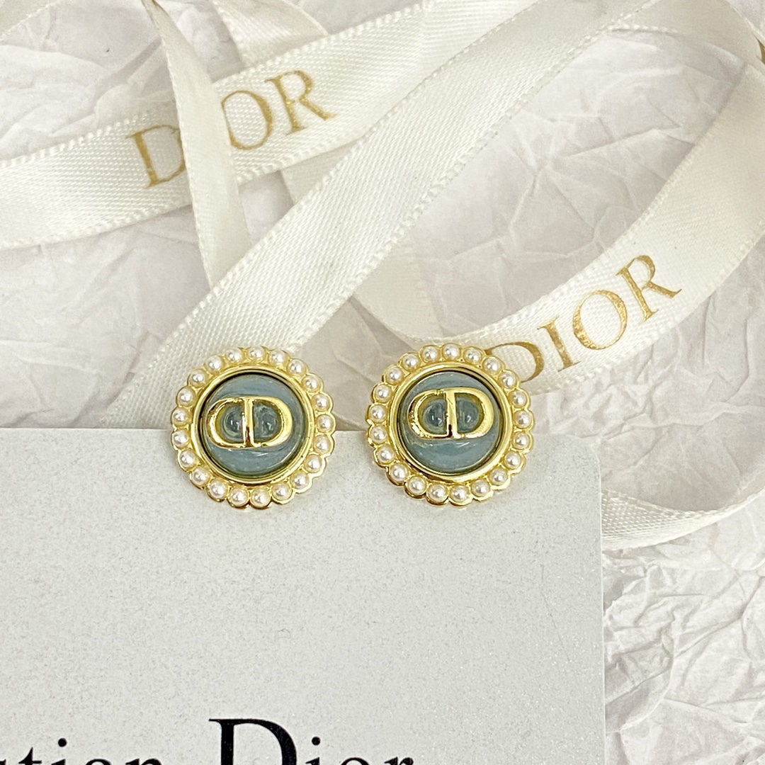 Dior button blue pearl stud earrings