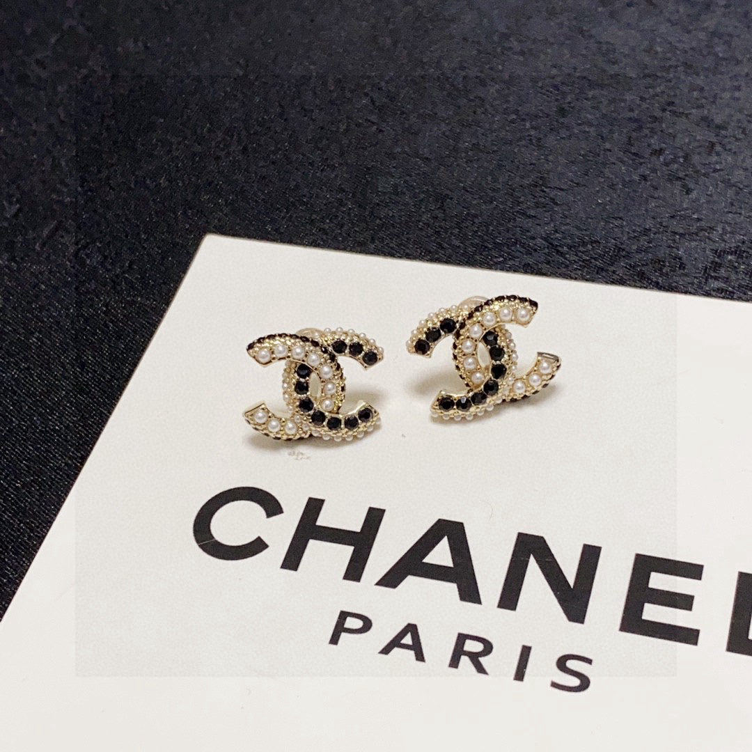 Chanel double C stud earrings with pearls and black diamonds