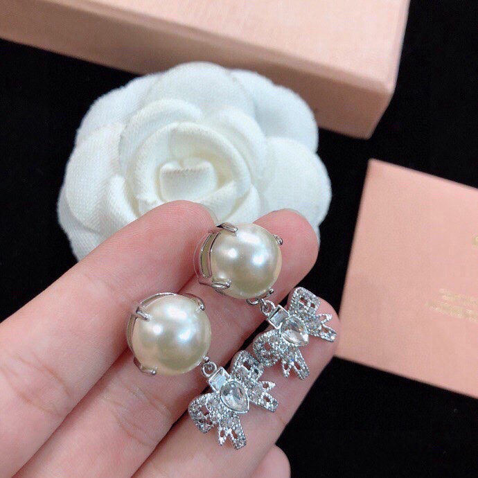 Miu Miu Paris runway bow earrings