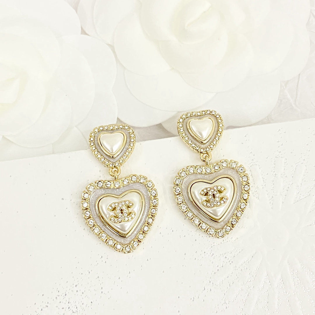 Chanel white mother-of-pearl double heart earrings