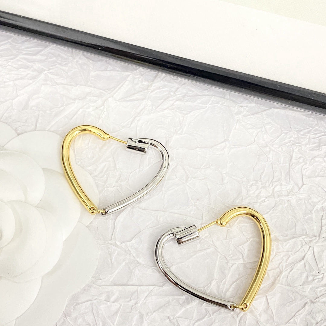 Celine gold and silver two-tone heart earrings