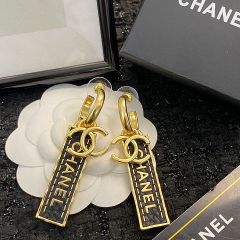 Chanel black and gold leather-textured double C logo earrings