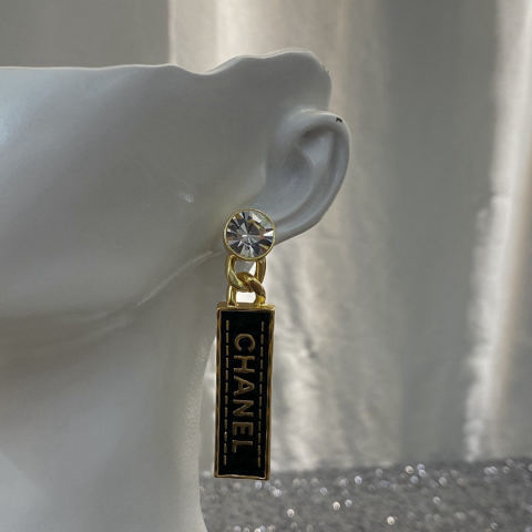 Chanel Black and Gold Leather Rhinestone Letter Stud Earrings
