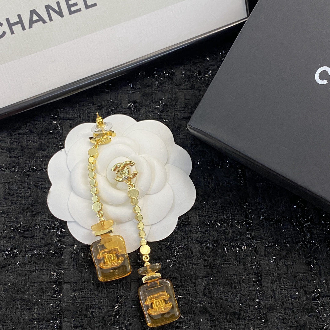 Chanel earrings, brown sugar glass perfume bottle rhinestone earrings