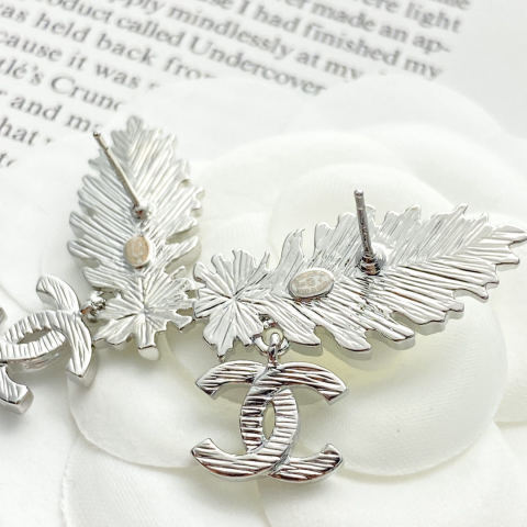 Chanel silver feather double C earrings