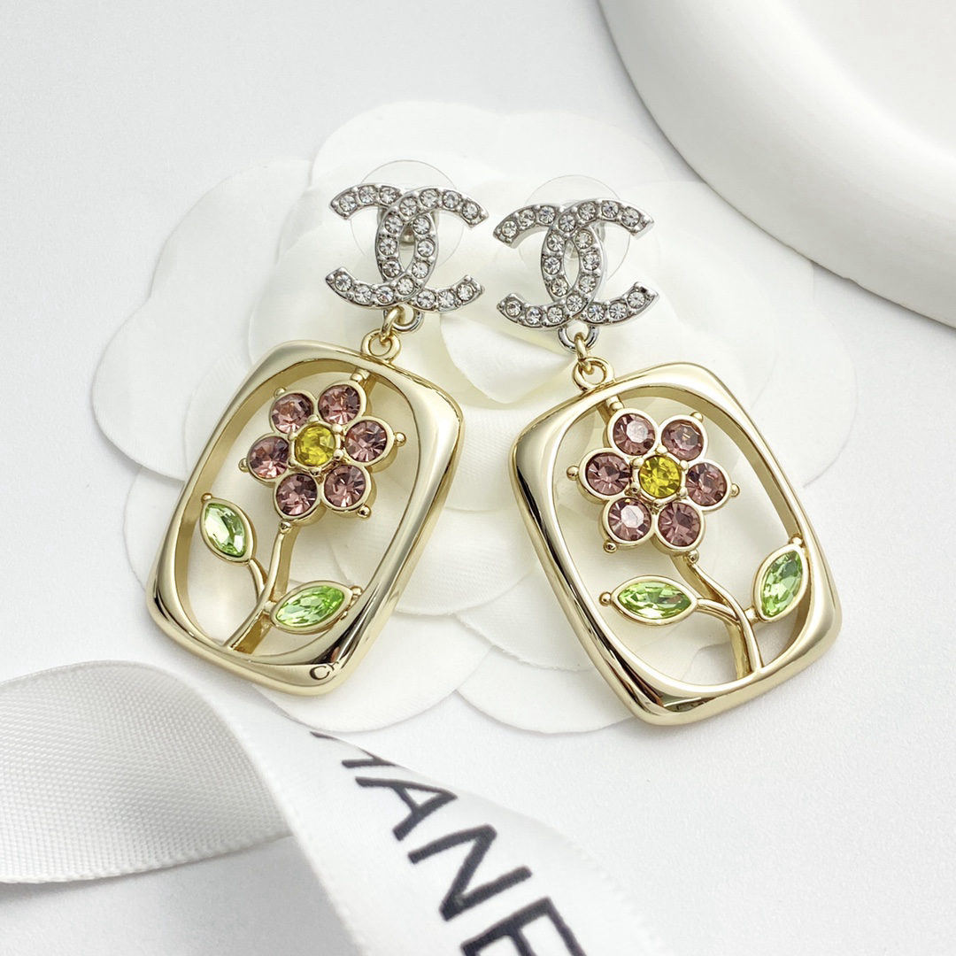 Chanel stud earrings with colorful rhinestone flower design