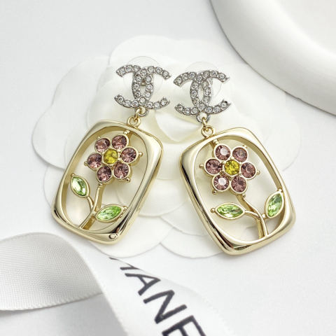 Chanel stud earrings with colorful rhinestone flower design