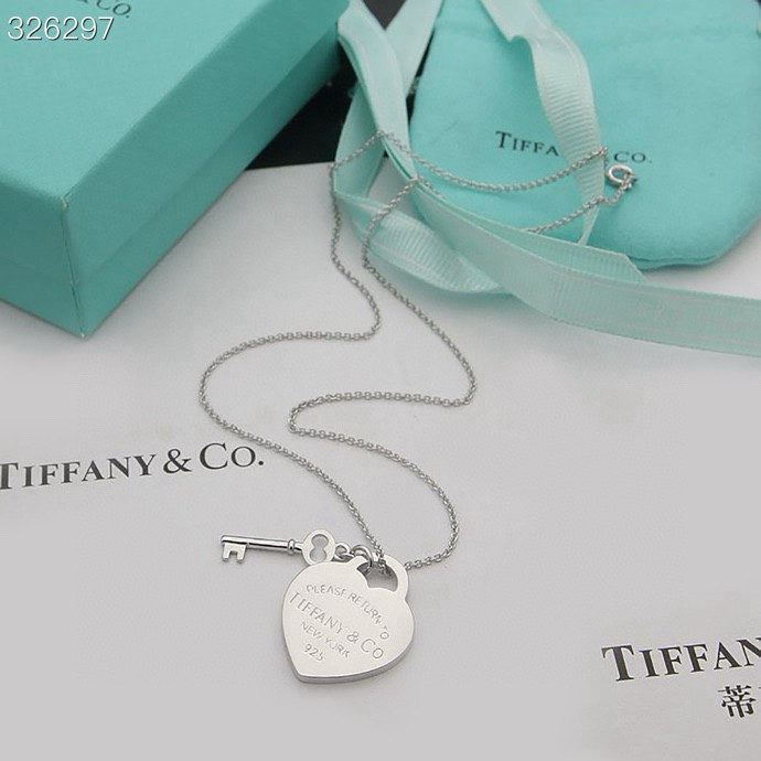 Tiffany necklace with heart-shaped key design and pendant.