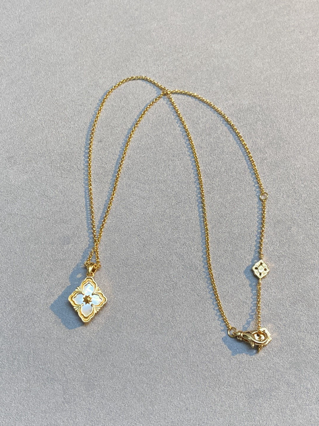 Buccellati white mother-of-pearl diamond-set single flower necklace