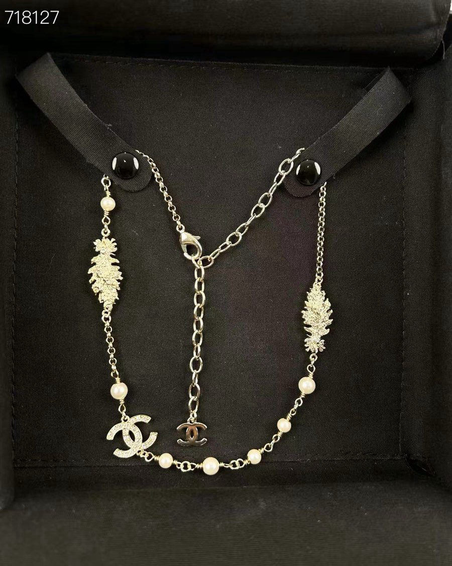 Chanel gold double C pearl feather wheat ear