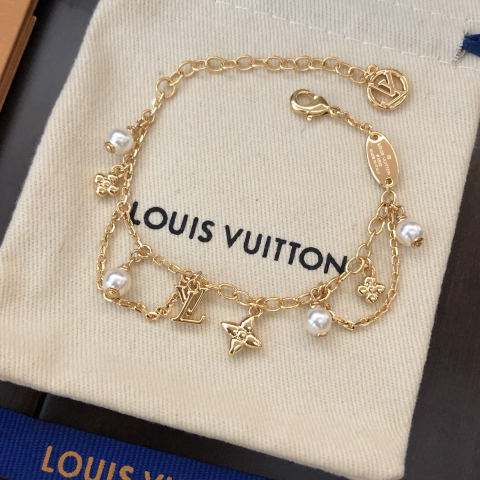 LV gold and pearl earrings bracelet necklace