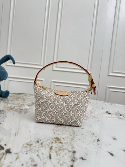 The mini moon handbag is made of soft material.
