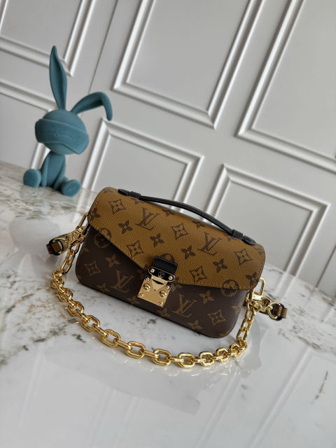 Pochette M��tis East West handbag