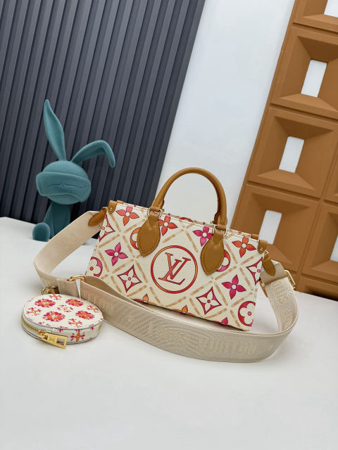 OnTheGo East West Handbags