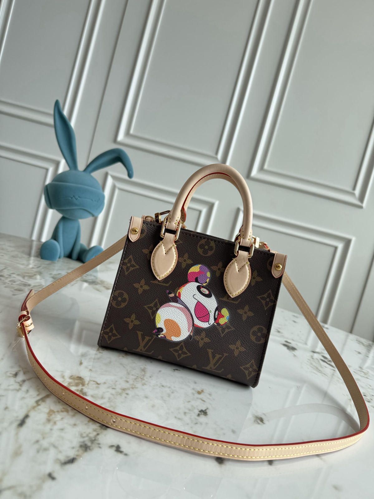 The petite version of the OnTheGo handbag