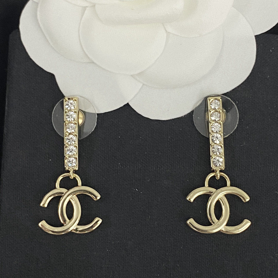 Chanel rhinestone pendant earrings, double C studs.